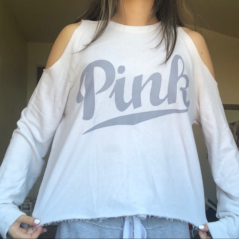 white sweater from PINK with cutout shoulders